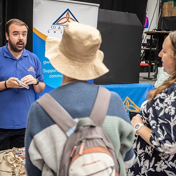 Holding Hand to Volunteer Officer